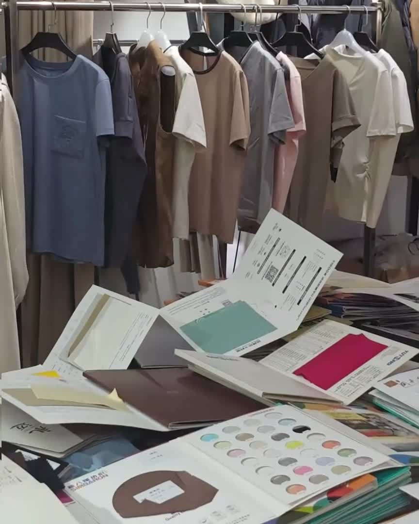 Sample garments and materials in the Mizora development room
